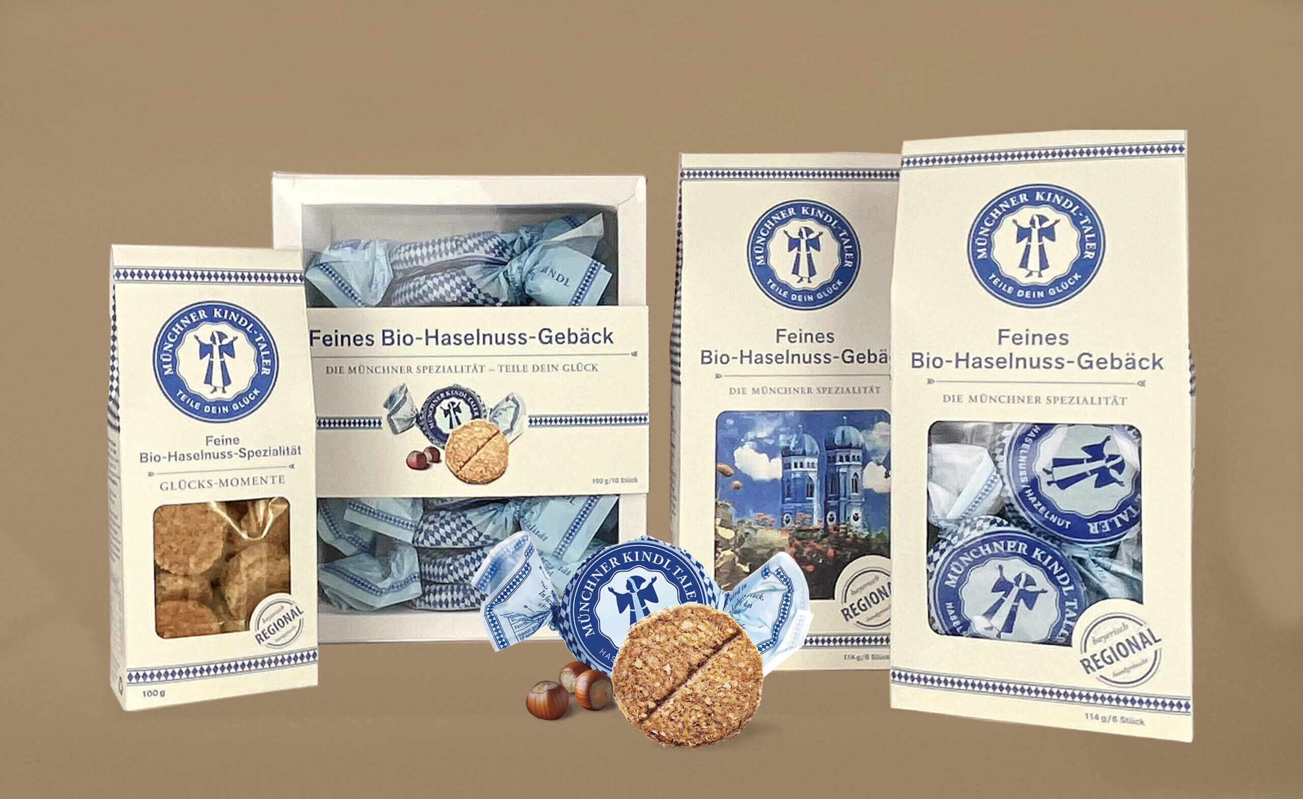 Übersicht der Verpackungen des Münchner Kindl-Talers